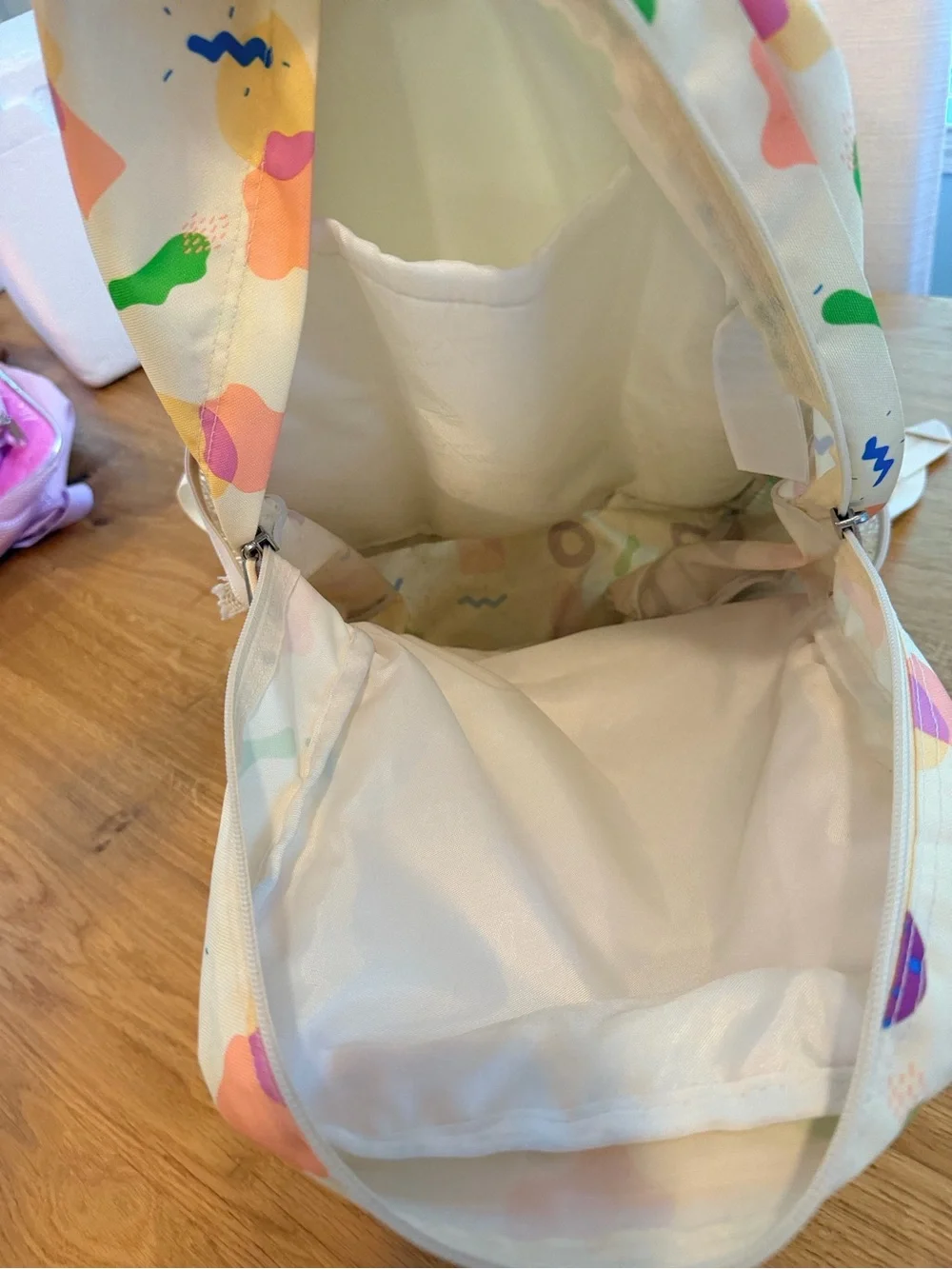 Jansport Cream Backpack with Pastel Pink, Purple & Green Shapes